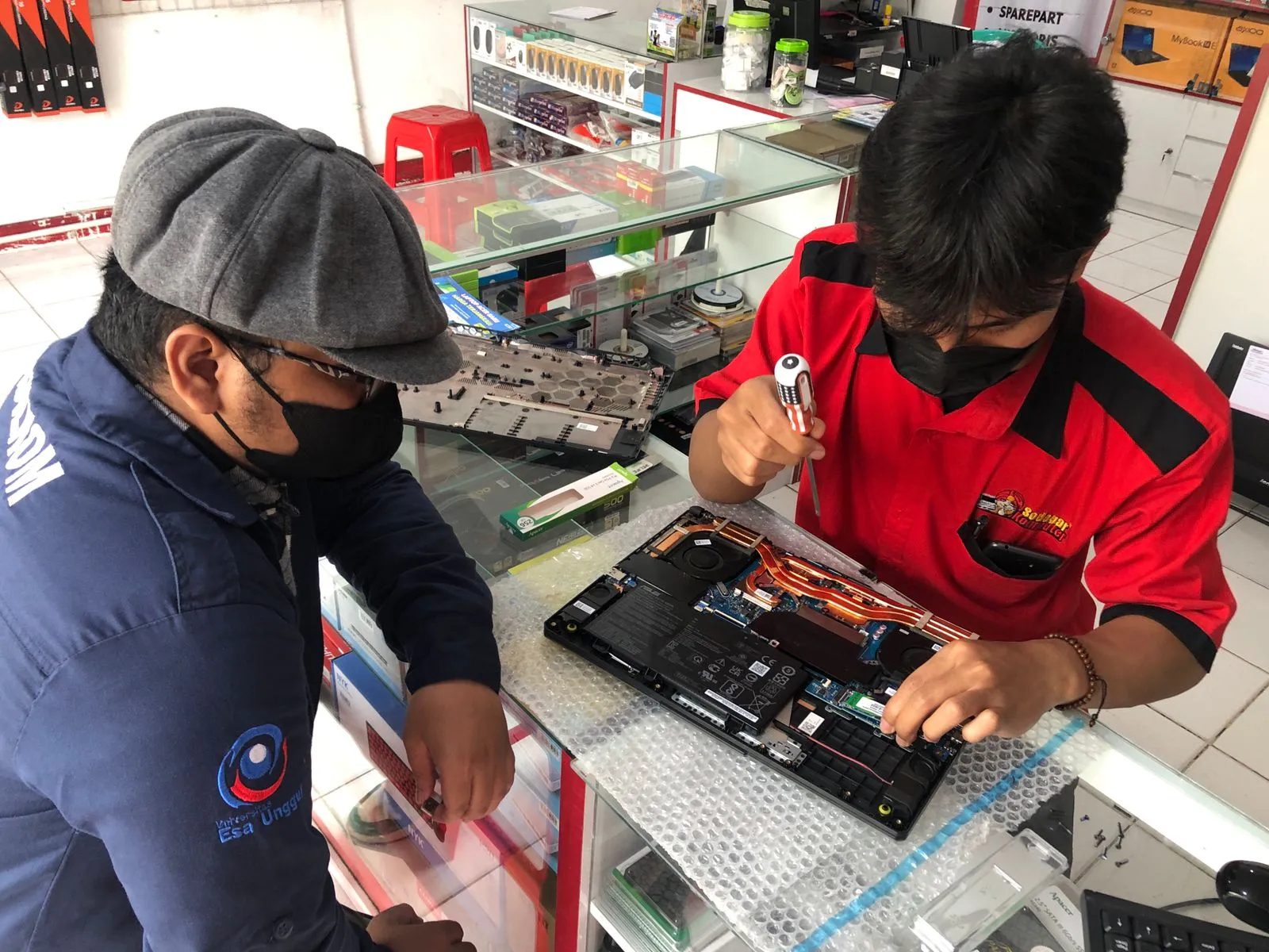 service laptop taman harapan baru bekasi